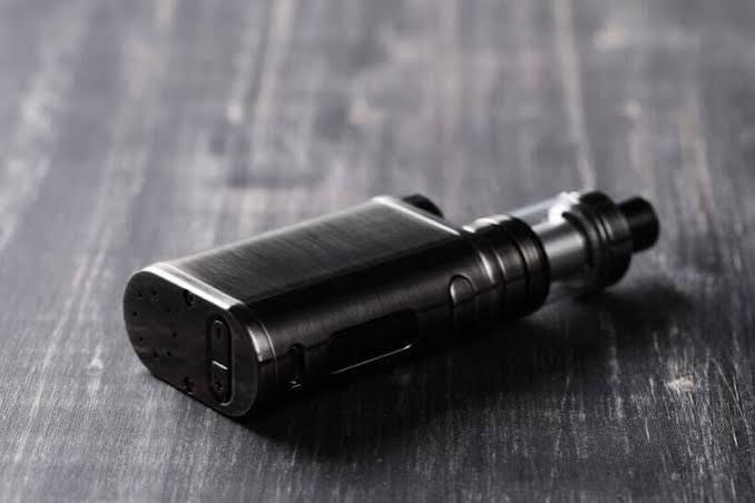 Wholesale distributor compliance team reviewing vape flavor ban regulations